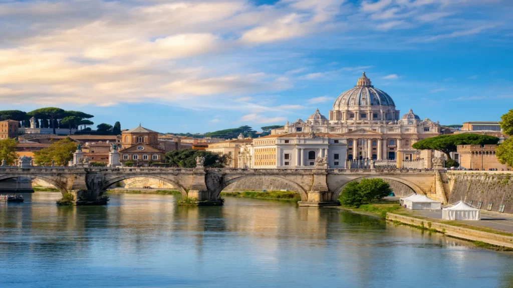 Scenic view of St. Peter's Basilica and the Tiber River in Rome, Italy, featured in a 5-day Rome travel itinerary for couples